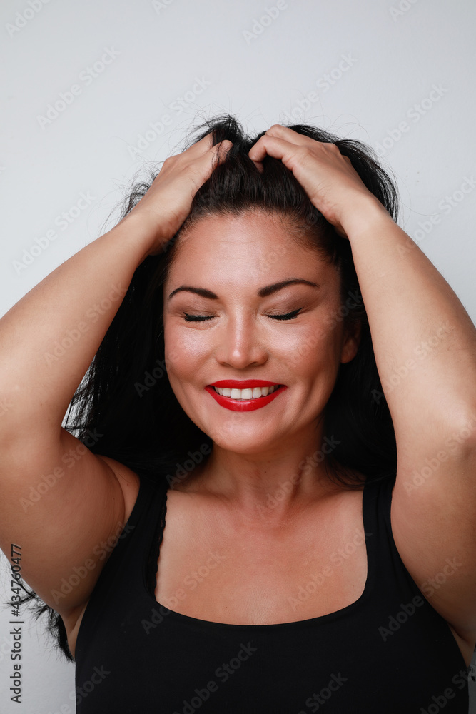 Portrait of pretty thoughtful woman with happy expression. Close-up portrait. Portrait of pretty thoughtful woman with happy expression. Close-up portrait.