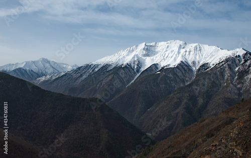 Russia. North-Eastern Caucasus, Republic of Dagestan. Snow peaks of mountain peaks near the village of Tlarata.