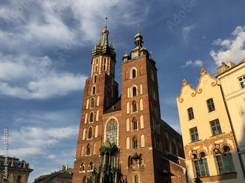 View of the St. Mary's Basilica, a Brick Gothic church adjacent to the Main Market Square in Kraków, Poland. It serves as one of the best examples of Polish Gothic architecture. 