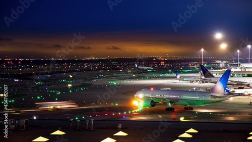 Generic Unmarked International Airport Airfield Night Timelapse with Moving Lights from Commercial Jet Airliners