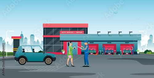 The service technician is reviewing the car repair list for the customer.