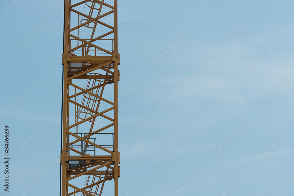 construction crane against blue sky