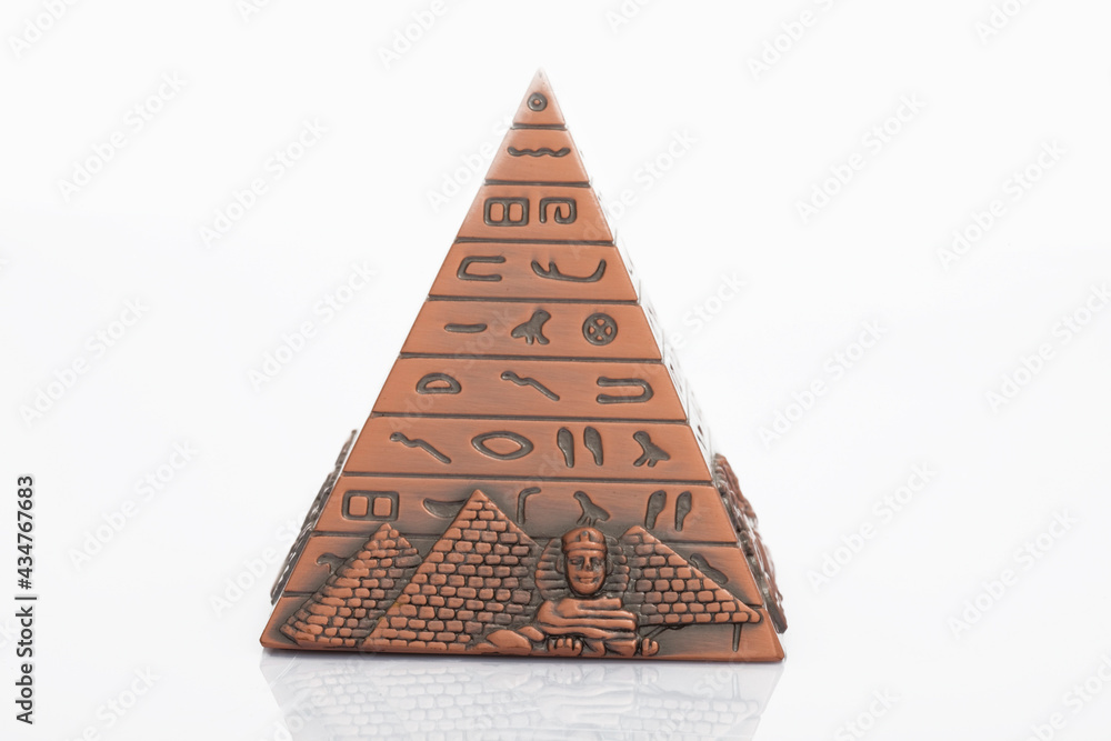 Egyptian Cheops pyramid souvenir on white background Egyptian Cheops pyramid souvenir on white background