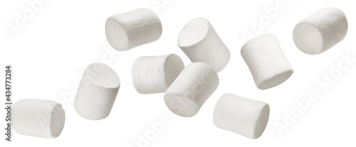 Falling marshmallows isolated on white background photo