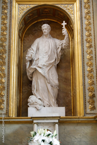 Saint Germain des Pres church, Paris, France. St Francois Xavier statue by Guillaume Coustou. The Jesuit missionary is depicted trampling paganism.