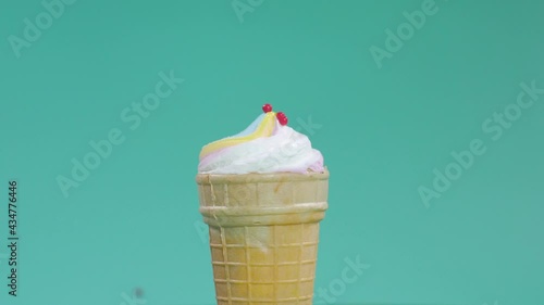 Ice cream sundae in a waffle cup. Slow motion 180 fps