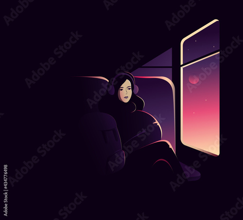 Lonely passenger. Young woman in a night bus looking through the window