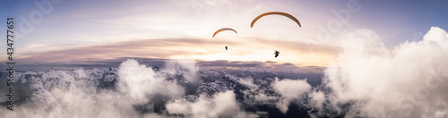 Photos Adventure Composite Image of Paraglider Flying up high in the Rocky Mountains