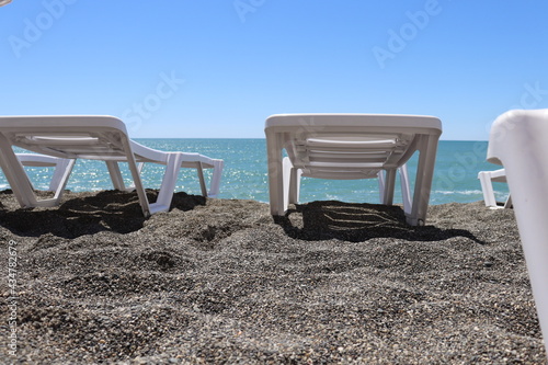 chairs on the beach © Игорь Чечин