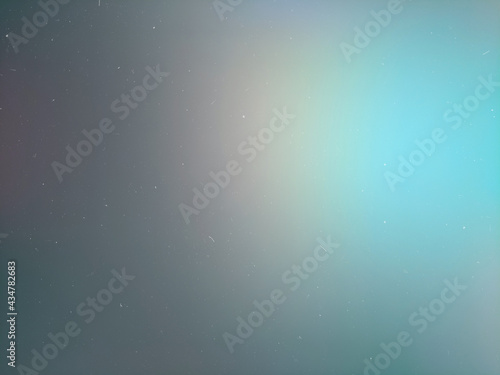 soft, blurry iridescent highlights creating a gradient