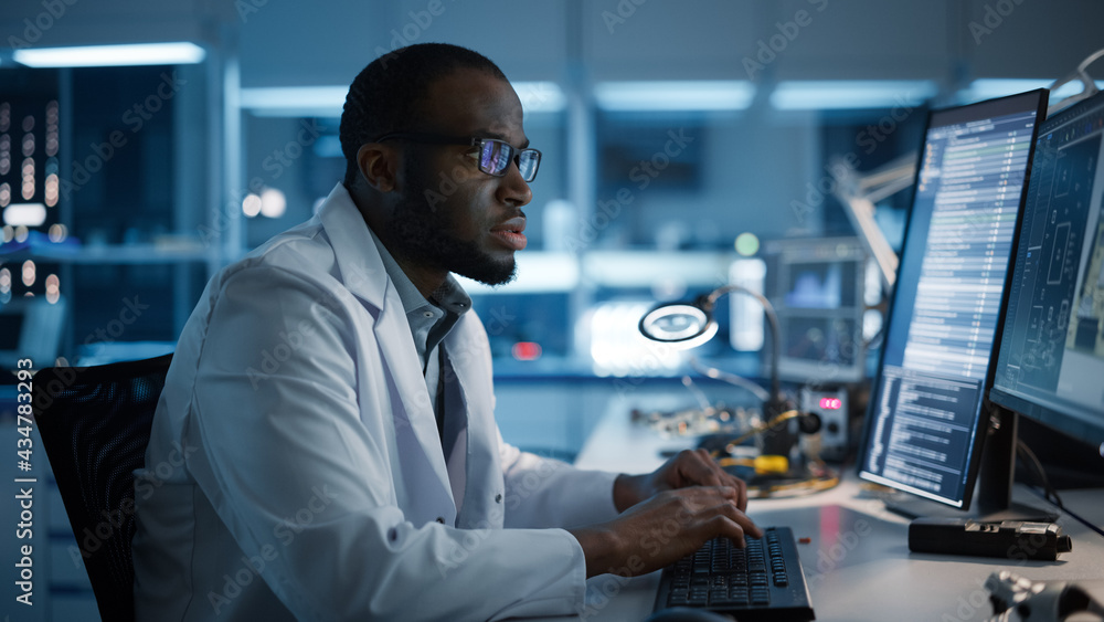 Modern Electronics Development Facility: Male Engineer Works on Computer with CAD Programming Software. Scientists Design of Industrial PCB, New Generation Silicon Microchips, Semiconductors Modern Electronics Development Facility: Male Engineer Works on Computer with CAD Programming Software. Scientists Design of Industrial PCB, New Generation Silicon Microchips, Semiconductors
