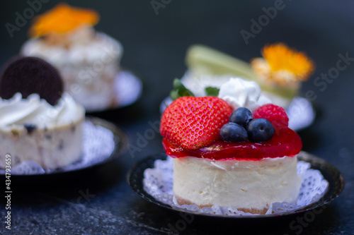 Fototapeta Naklejka Na Ścianę i Meble -  Mini cakes close up deserts in a garden