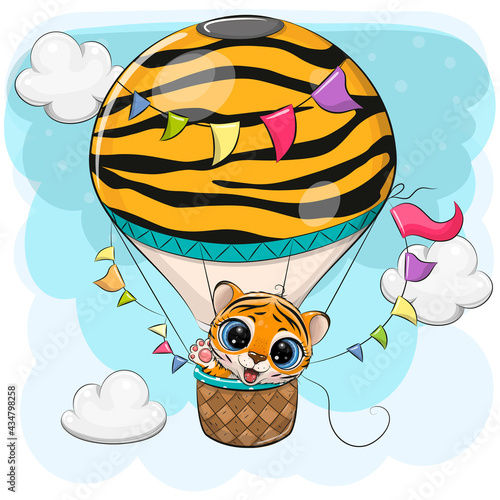 Cartoon Tiger is flying on a hot air balloon