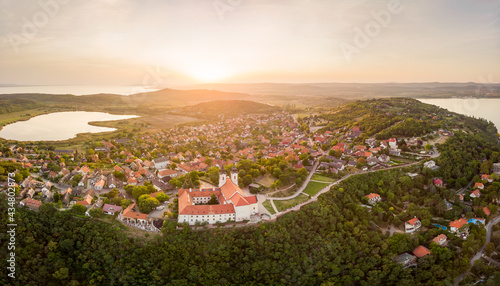 Fototapeta Naklejka Na Ścianę i Meble -  Aerial panoramic view of the famous Tihany - Hungary near the Balaton lake, including the Benedictine Monastery of Tihany (Tihany Abbey, Tihanyi Apatsag) during sunset