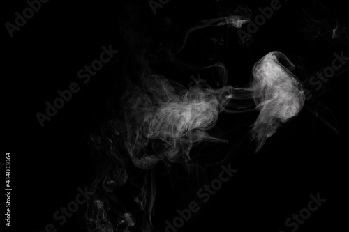 steam smoke effect on solid black background with abstract blur motion wave