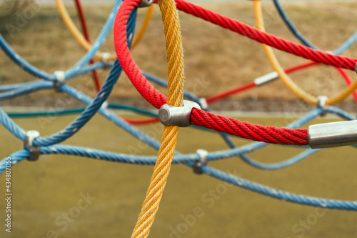 A network of ropes for sports. Children's sports ground with ropes.