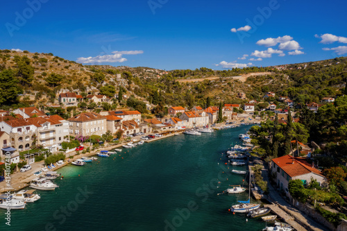 Fototapeta Naklejka Na Ścianę i Meble -  Bobovisca Na Moru village aerial view, Island of Brac, Dalmatia, Croatia. August 2020