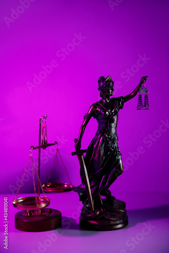 Lady Justice on purple background. Vertical image