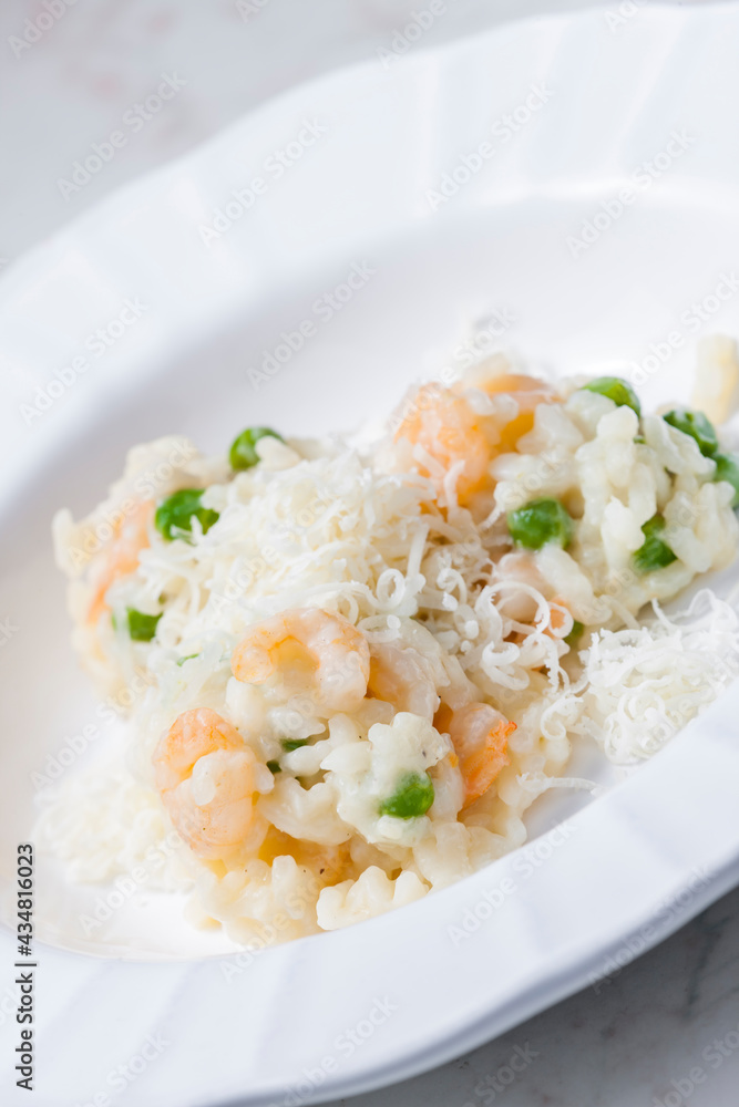 Italian risotto with shrimps and green peas Italian risotto with shrimps and green peas