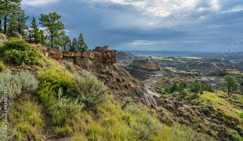 Fototapeta Naklejka Na Ścianę i Meble -  Stormy sunrise at the Makoshika State Park in Montana - Badlands