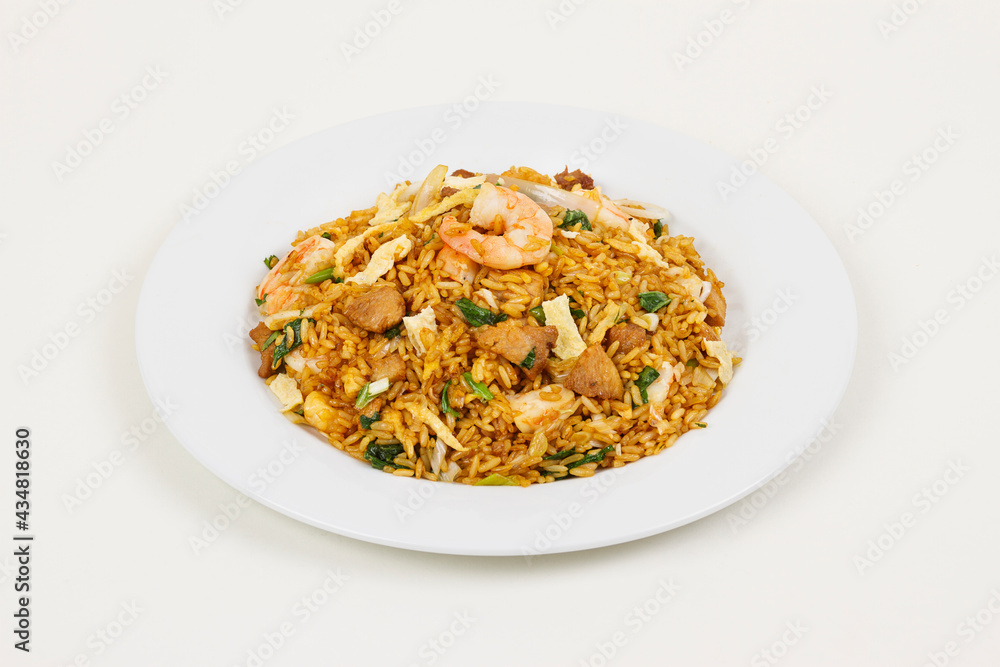 Meat and shrimps fried rice and noodles. Meat and shrimps fried rice and noodles.