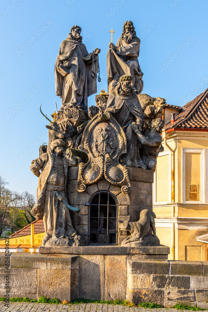 Statue of John of Matha, Felix of Valois and Saint Ivan on Charles Bridge in Prague, Czech Republic