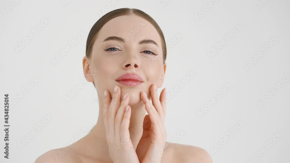 Beauty woman face healthy skin massage hands touching face clean skin beauty female young cosmetic model Beauty woman face healthy skin massage hands touching face clean skin beauty female young cosmetic model