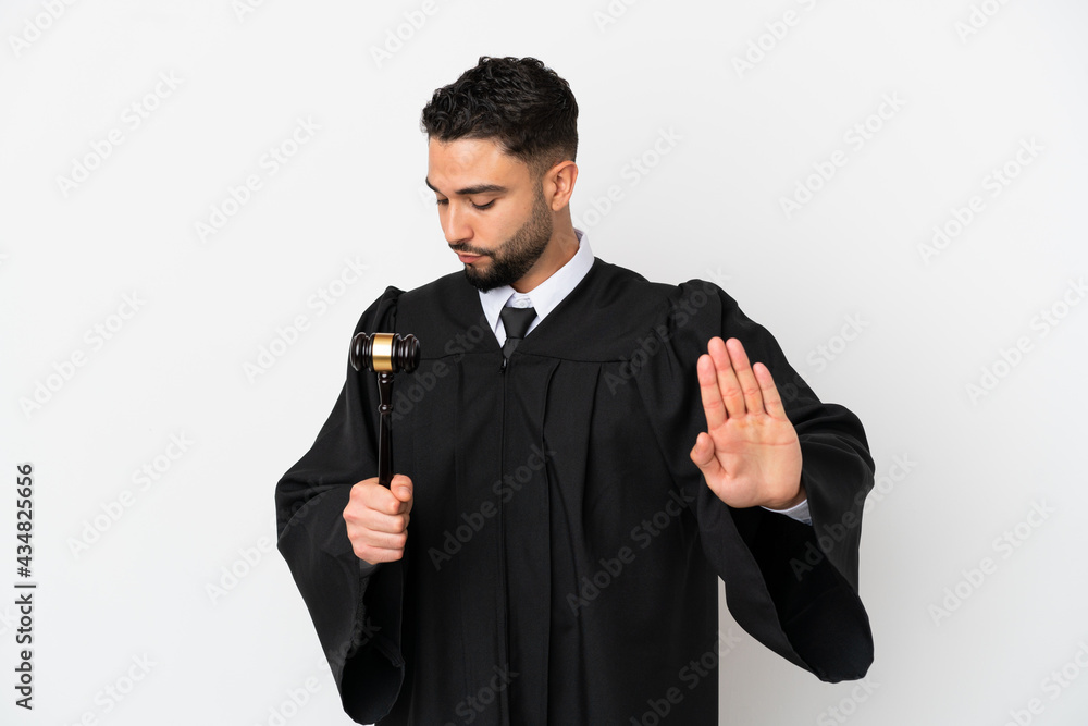 Judge arab man isolated on white background making stop gesture and disappointed Judge arab man isolated on white background making stop gesture and disappointed