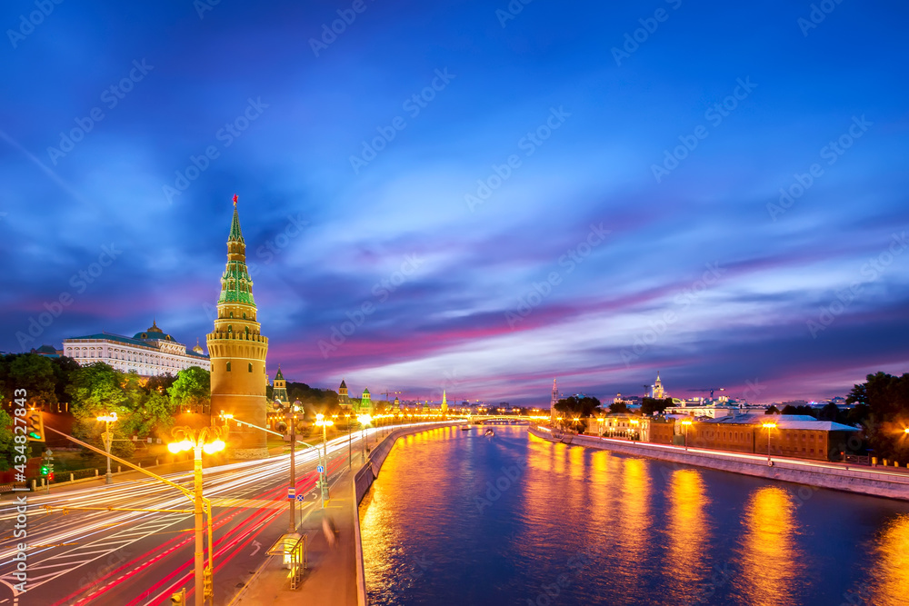 Moscow embankment view with Kremlin wall tower during summer sunset