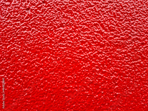 background bright red wall with bulges