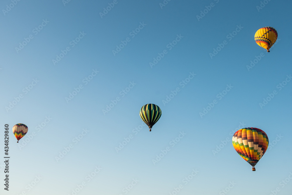 Fototapeta premium Hot air balloon take to the sky.