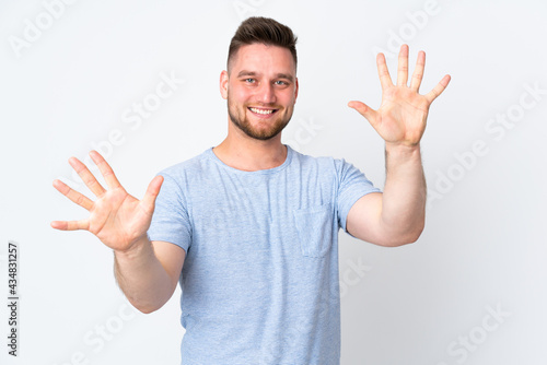 Russian handsome man over isolated background counting ten with fingers © luismolinero