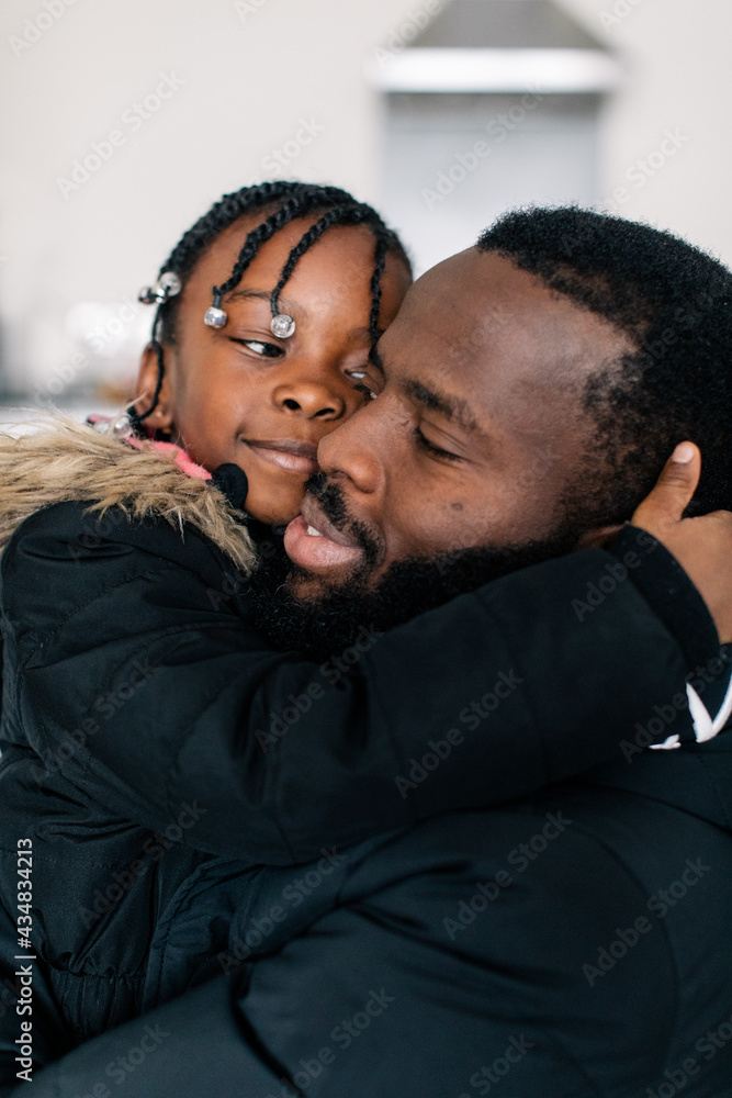 Father and daughter hugging each other Father and daughter hugging each other