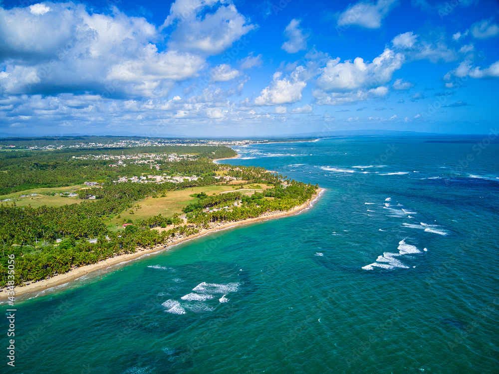 Beach in the Dominican Republic with waves, aerial view
