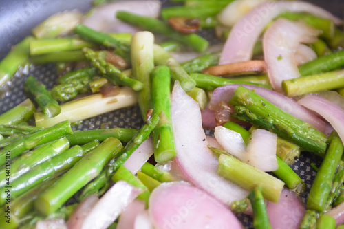 asparagus and onion stir fry in pan