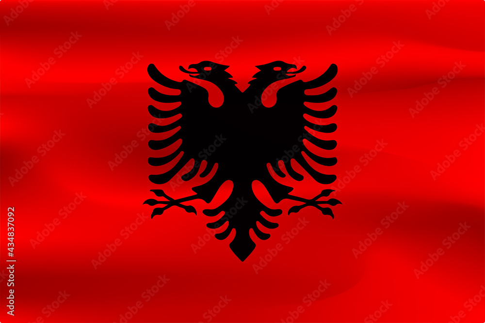 The flag of Albania is beautifully wrinkled with a weight of shadow. The flag of Albania is beautifully wrinkled with a weight of shadow.