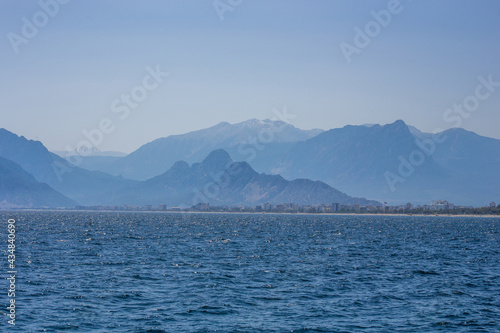 View of the mediterranean sea against the backdrop of high taurus mountains