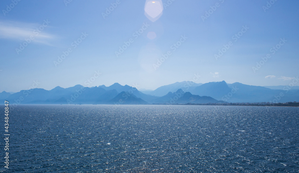 Obraz premium View of the mediterranean sea against the backdrop of high taurus mountains