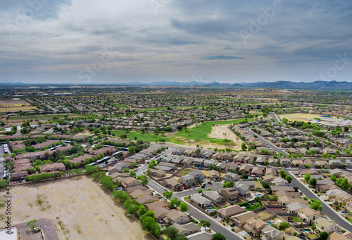 Aerial view in the sleeping area with the road over Avondale small town in AZ USA
