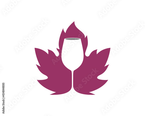 Wine glass silhouette in the grape leaf