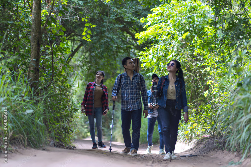 Asian friends group enjoy hiking on vacation. Asian friends group enjoy hiking on vacation.