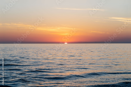 Beautiful sunset landscape on the blue sea.