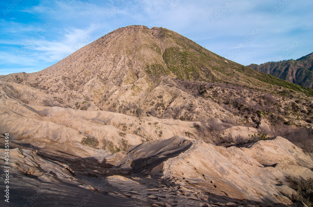 Fototapeta premium Beautiful view of Desert of Bromo Mountain in Bromo Tengger Semeru National Park, East Java, Indonesia. A Popular tourist destination.