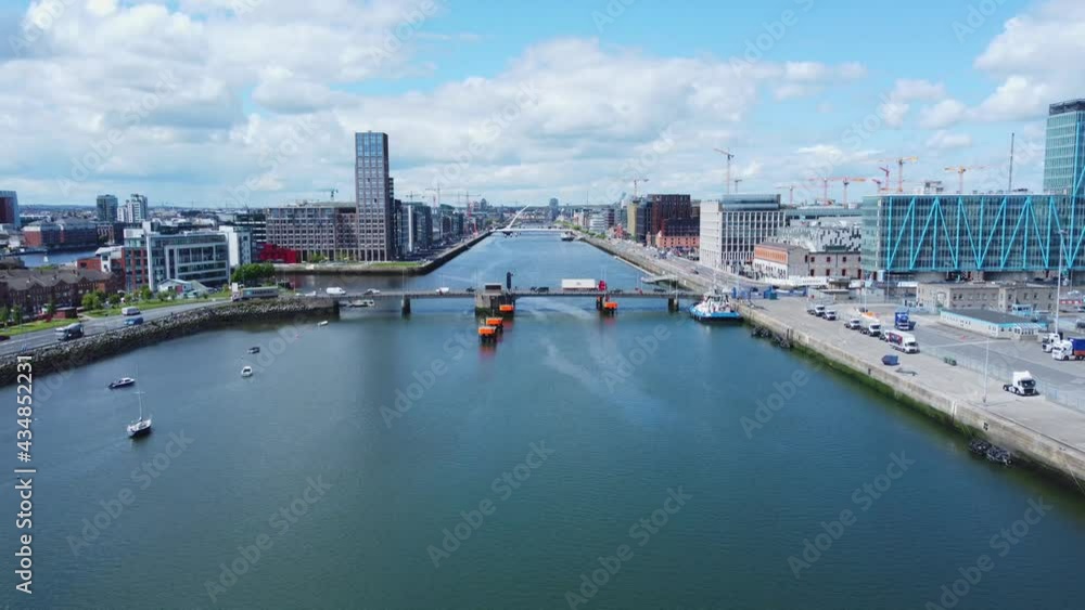 Aerial approach to Tom Clarke Bridge in Dublin with view over Dublin. Aerial approach to Tom Clarke Bridge in Dublin with view over Dublin.