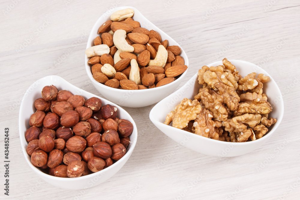 Various nuts and almonds as source healthy natural vitamins and minerals, nutritious eating Various nuts and almonds as source healthy natural vitamins and minerals, nutritious eating