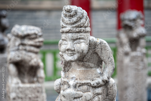 Chinese statues. Unusual sculptures in close-up. photo