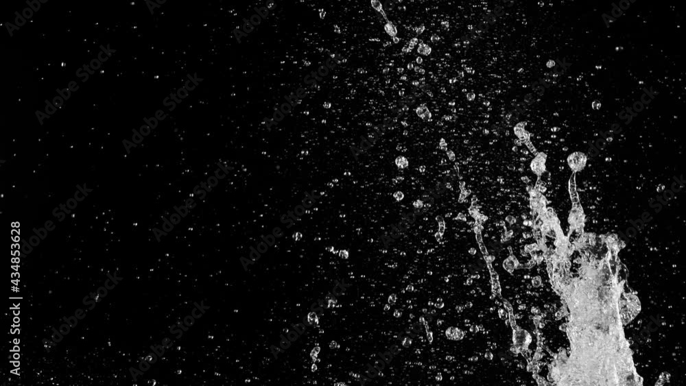 Super slow motion of splashing water isolated on black background. Filmed on high speed cinema camera, 1000 fps. Super slow motion of splashing water isolated on black background. Filmed on high speed cinema camera, 1000 fps.