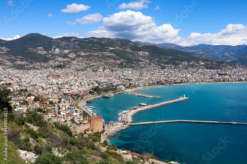Fototapeta Naklejka Na Ścianę i Meble -  panoramic view to the city of Alanya, marina, sea and mountains from the top of the fortress wall