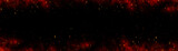 Fire embers particles over black background. Fire sparks background. Abstract dark glitter fire particles lights.	
