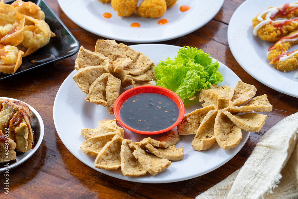 Indonesian specialities made from tofu are served on the table.